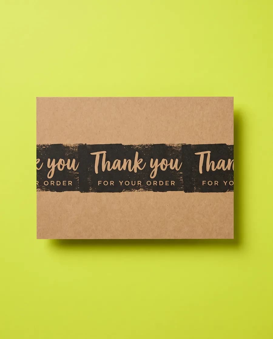 Kraft proof card on acid green: Thank you in script over FOR YOUR ORDER, an inverted 30 mm band, printed with a Rolly 3.0