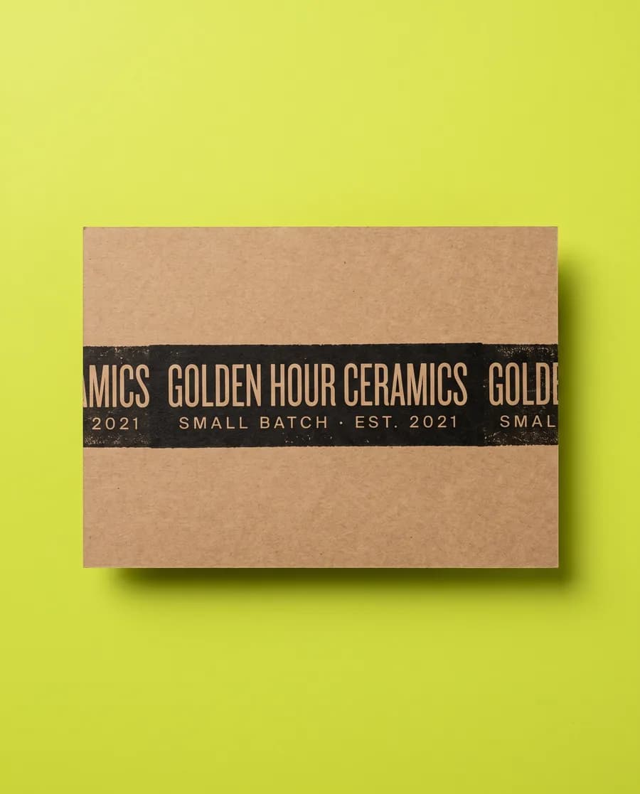 Kraft proof card on acid green: Golden Hour Ceramics over Small batch, est. 2021, a 30 mm band, printed with a Rolly 3.0