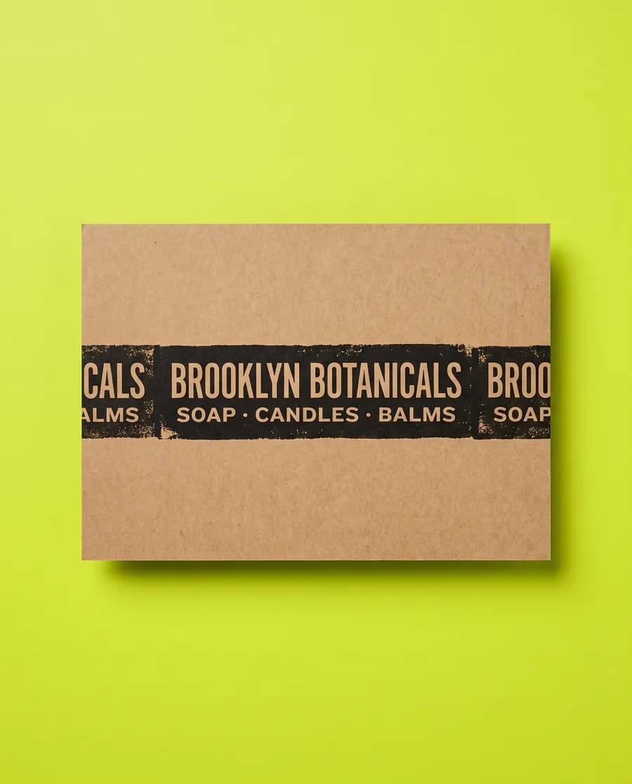 Kraft proof card on acid green: Brooklyn Botanicals over Soap, candles, balms, an inverted 30 mm band, printed with a Rolly 3.0